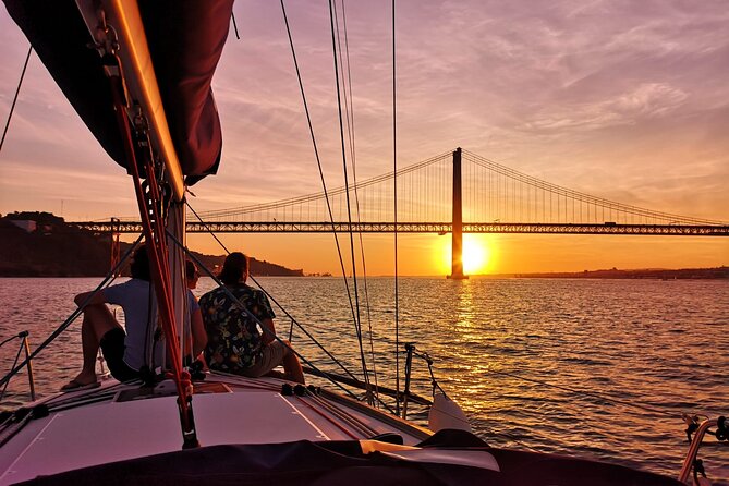 Lisbon Small Group Sunset Sailing 2h Cruise with Drinks Included - Commerce Square and Old Lisbon from a quieter angle