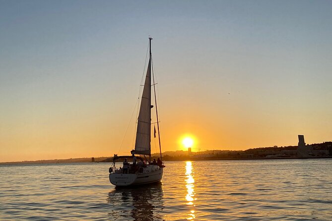 Lisbon Small Group Sunset Sailing 2h Cruise with Drinks Included - The Monument to the Discoveries from the river