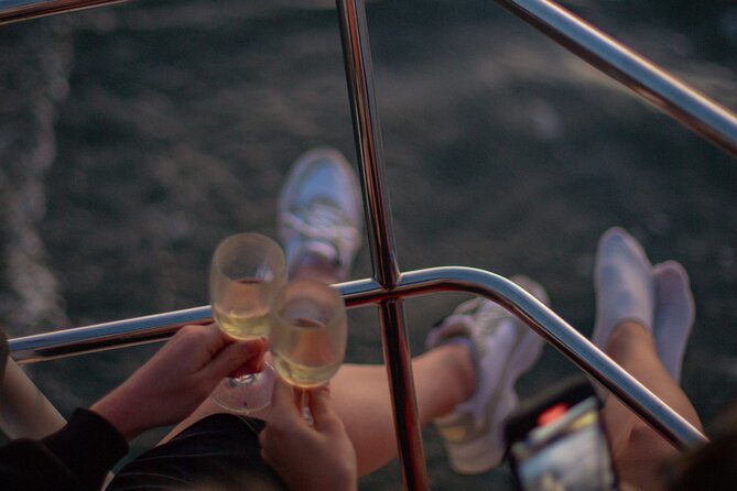 Lisbon Sunset Boat Cruise Tour With Drinks Included - Christ the King and the 25 de Abril Bridge