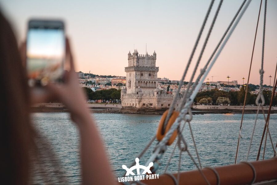 Lisbon: Sunset Boat Party with 2 Drinks and Free Club Entry - A sunset party with Lisbon as the backdrop