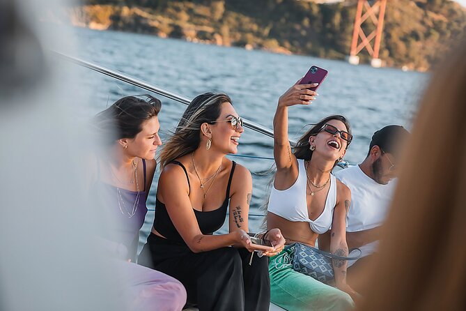 Lisbon : Sunset Catamaran Boat Tour with Music and Drinks - The medical research foundation on the waterfront
