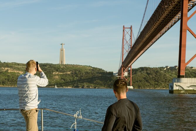 Lisbon: Sunset Catamaran Boat Tour with Music and Drinks - Choosing between the nets and covered terrace
