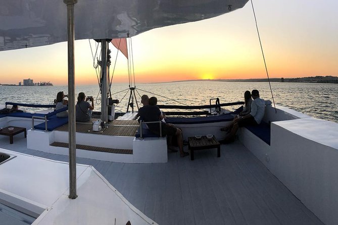 Lisbon Sunset Catamaran Cruise on the Tagus River - Christ the King across the river