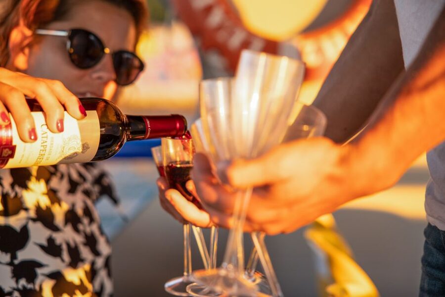 Lisbon: Sunset Cruise with Live DJ and Drinks - Under the 25 April Bridge toward Cristo Rei