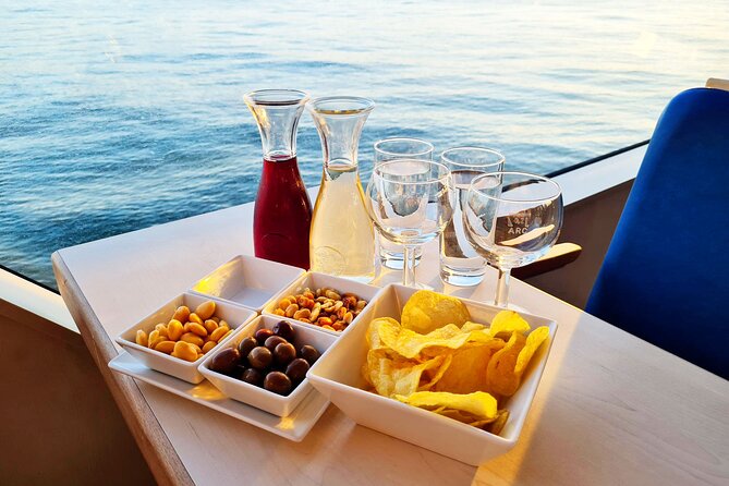 Lisbon Sunset cruise with Welcome Drink and Snack included - The Monument to the Discoveries