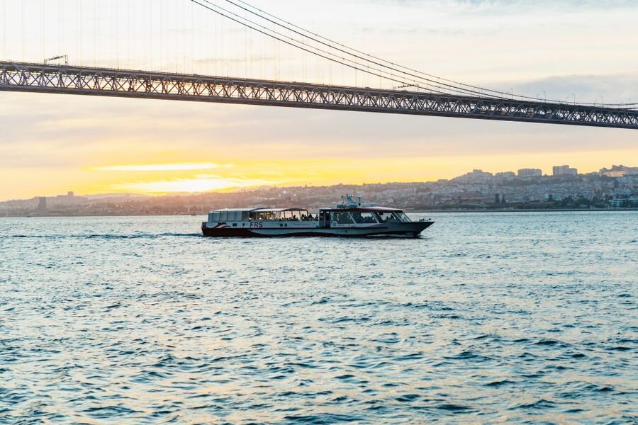 Lisbon: Sunset Cruise with Welcome Drink and Snacks - Praça do Comércio from the water