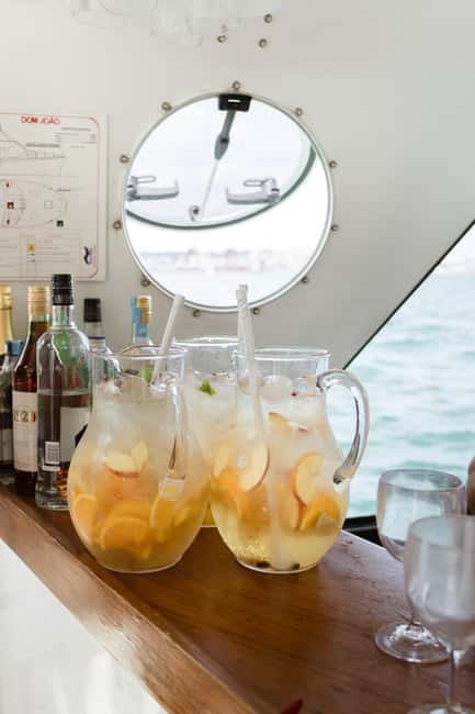 Lisbon: Sunset/Night Boat Party with Open Bar, Snacks & DJ - Music, dancing, and the social mix
