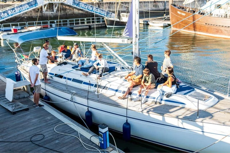 Lisbon: Sunset Sailing Boat Tour with Drinks - The boat, seating, and onboard comfort