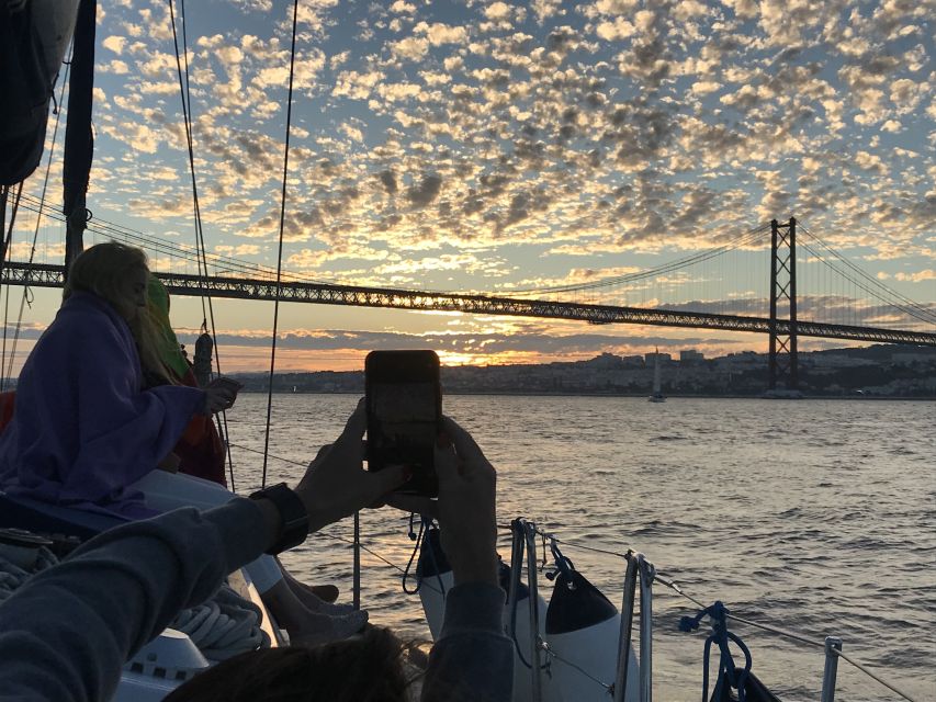 Lisbon: Sunset Sailing Cruise with Wine - Wine, snacks, and the social mood