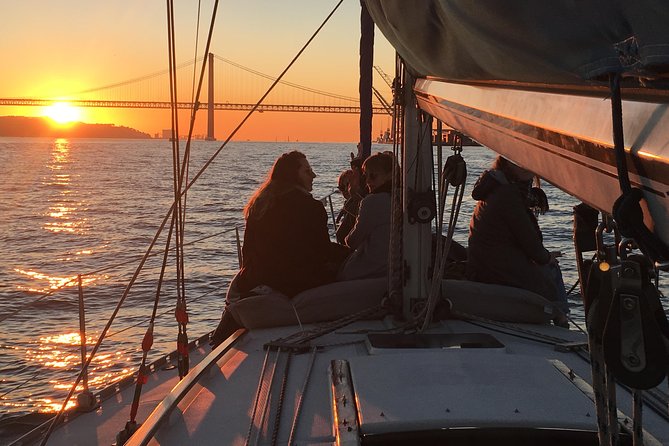 Lisbon Sunset Sailing Tour with White or Rosé Wine and Snacks - Cristo Rei across the river