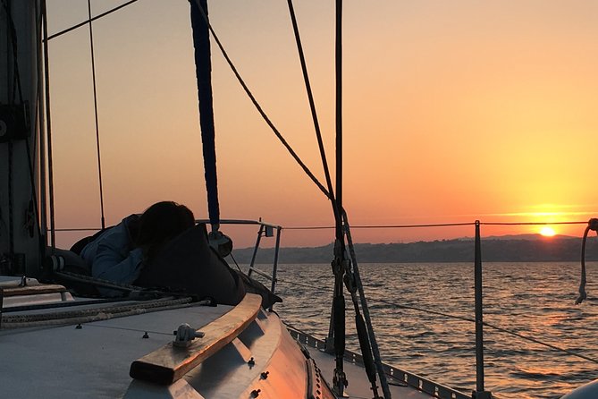 Lisbon Sunset Sailing Tour with White or Rosé Wine and Snacks - MAAT, palaces, and museum-lined shore