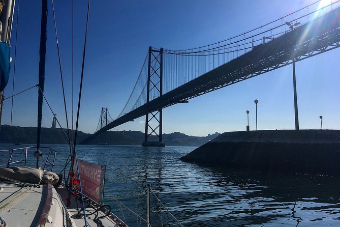Lisbon Sunset Sensations on a Private Sailing Boat with wine&snacks - Wine, snacks, music, and the social side