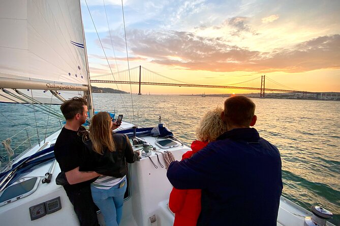 Lisbon: Sunset Tagus River Sailing Tour with Drinks - Passing beneath the 25 de Abril Bridge