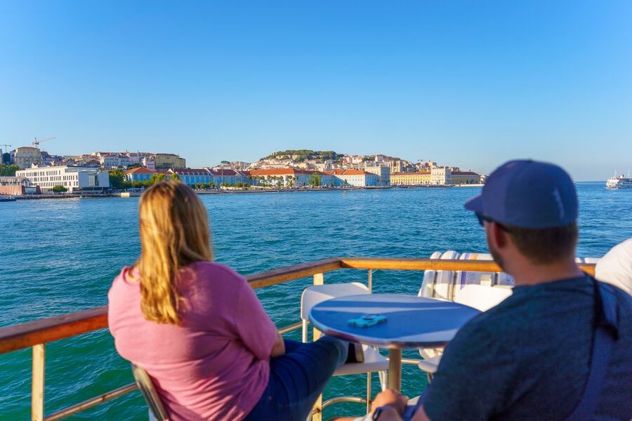 Lisbon: Tagus River Boat Tour with One Drink Included - Audio guide, music, and how much information to expect
