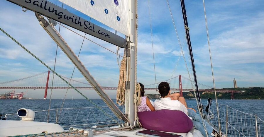Lisbon: Tagus River Sunset Cruise with Drinks - Commerce Square and Alfama from the water