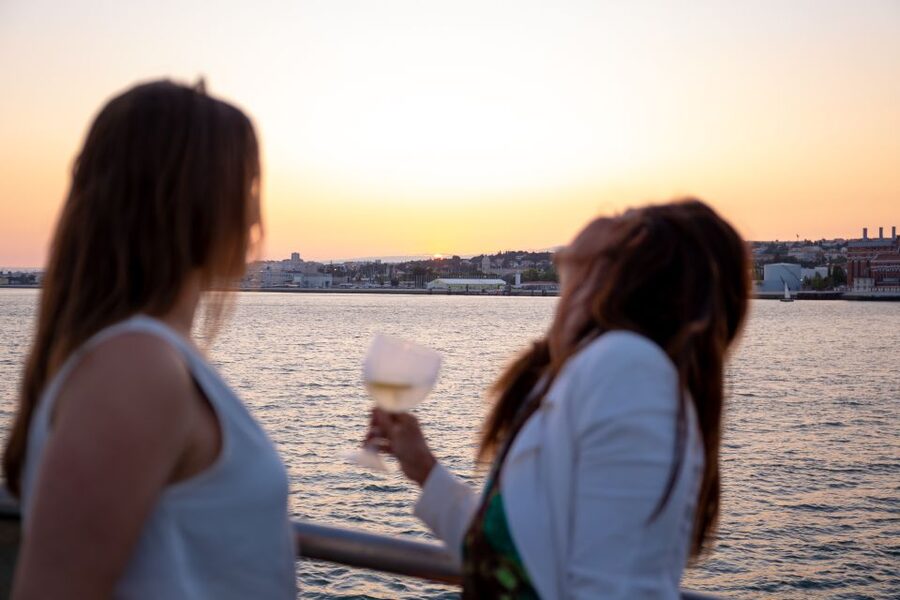 Lisbon: Tagus River Sunset Tour with Snacks and Drink - Commerce Square and the opening view