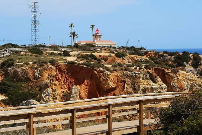 Lisbon to Algarve Private Tour: Benagil Caves Cruise & Top Sights - Entering the Benagil Caves by small boat