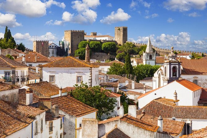 Lisbon to Porto Up To 5 Stops Óbidos Nazaré Fátima Coimbra Aveiro - Key points to know before booking
