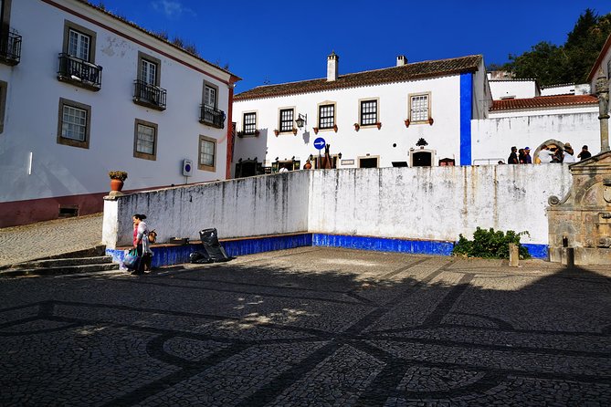 Lisbon to Porto Up To 5 Stops Óbidos Nazaré Fátima Coimbra Aveiro - The guides make or break a long private day