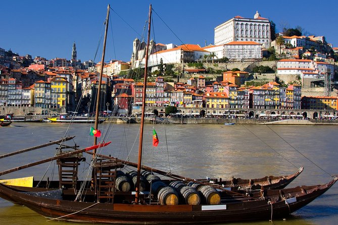 Porto Private Tour from Lisbon with Douro Cruise and Wine Tasting - Walking across the Dom Luís I Bridge
