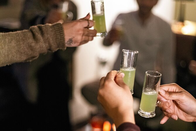 Private Night Bar Crawl in Lisbon with Local Guide and Drinks - Starting at Largo do Carmo with a drink and a story