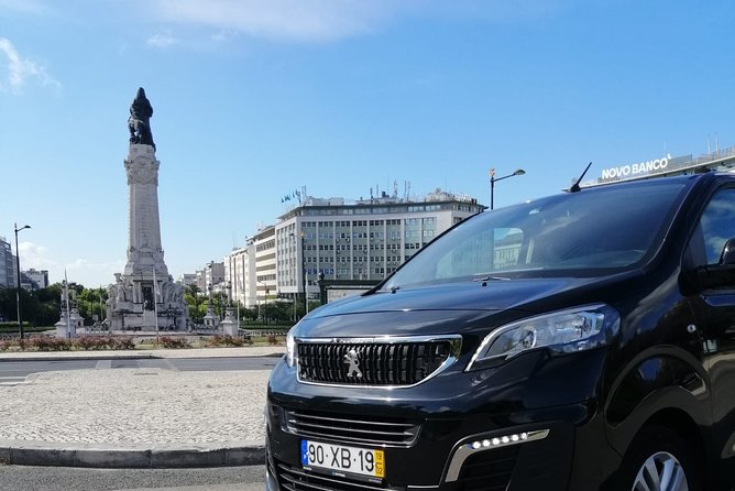 Private Round-Trip Transfer – Lisbon Airport & City Center - Luggage help and doorstep drop-off