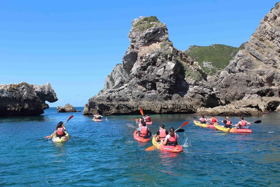 Sesimbra: Ribeiro Cavalo Beach, Caves, & Arrábida Kayak Tour - Paddling along the Arrábida coast