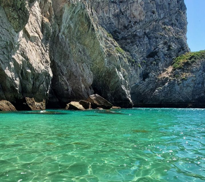 Sesimbra: Secret Bays and Beaches Boat Tour with Snorkeling - Caves, cliffs, and the view from the water