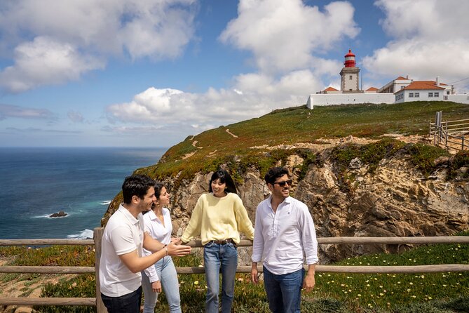 Sintra: Pena Palace & Cabo da Roca Hike from Lisbon - Reaching the rocks and caves of Adraga Beach