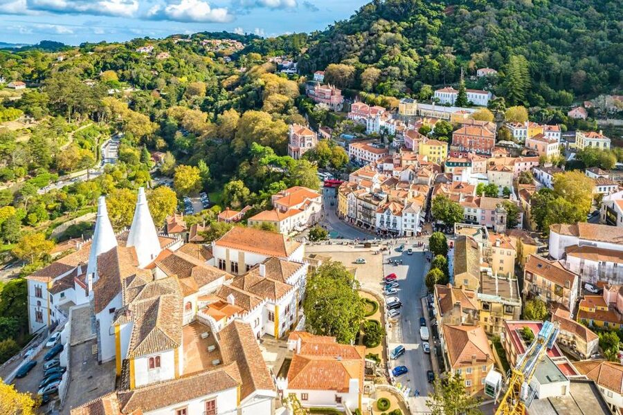 Sintra: Private Tour with Guided Pena Palace Experience - A short walk through Sintra Village