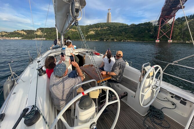 Sunset Boat Tour in Lisbon with Wine - Padrão dos Descobrimentos and the riverfront story