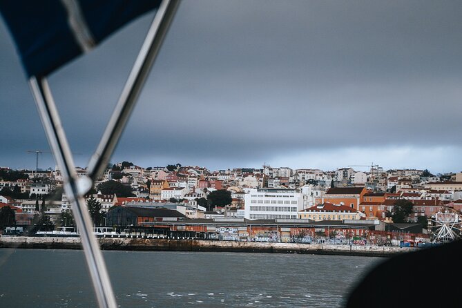 Sunset Sailboat Tejo River Tour 2h - The return to Alcântara with a glass of wine