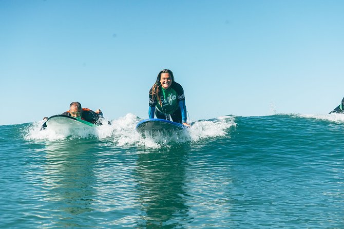 Surf Lesson in Lisbon - The surf experience - Crossing the 25 April Bridge to Tarquinio beach