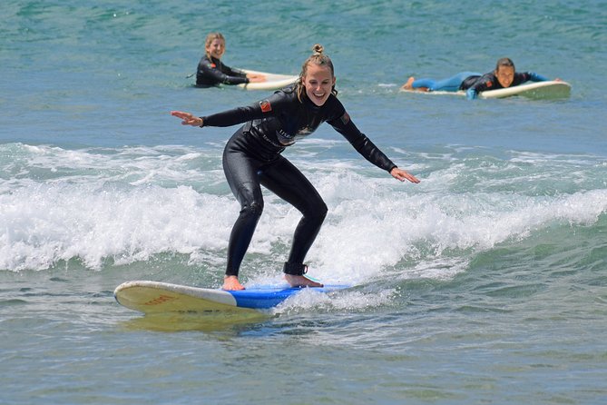 Surf Lesson - Learning the wetsuit, board, and pop-up