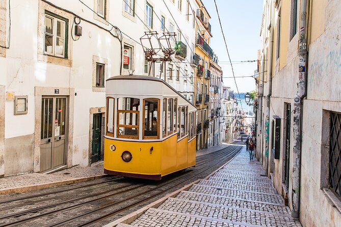 Tuk tuk experience through the historic neighborhood of Alfama - Walking the narrow lanes of Alfama