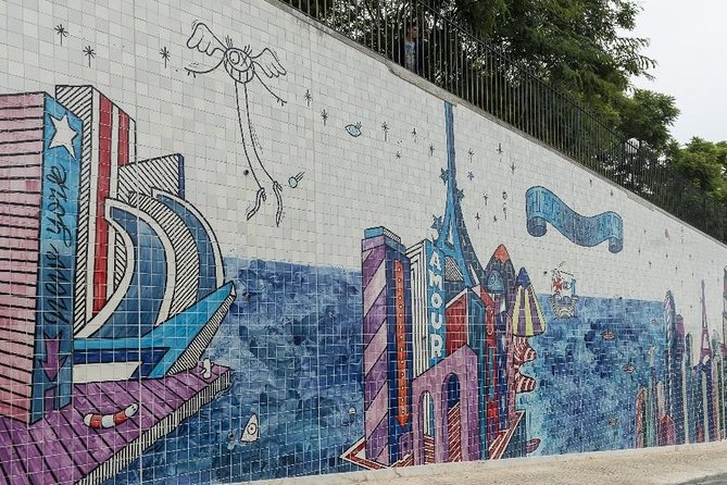 Tuk Tuk Lisbon: Exploring Urban Art - Avenida Fontes Pereira de Melo’s Three-Building Canvas